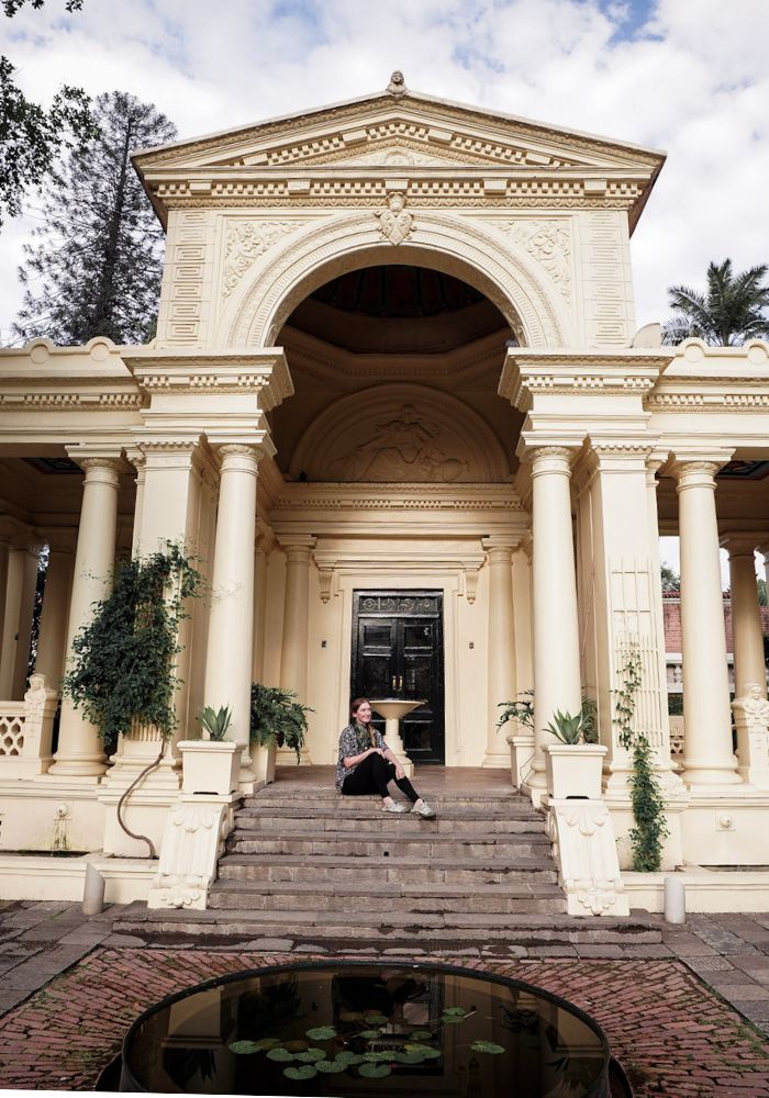 Monica seated at the Garden of Dreams, one of the Best Places To Visit in Kathmandu, Nepal.